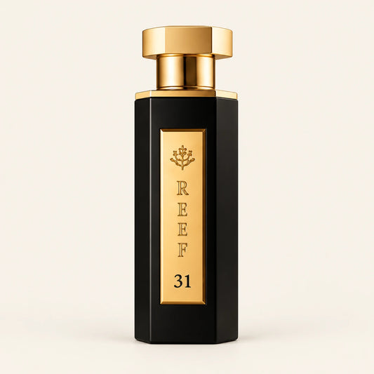 REEF 31 Eau de Parfum 100ml on a plain ivory studio background