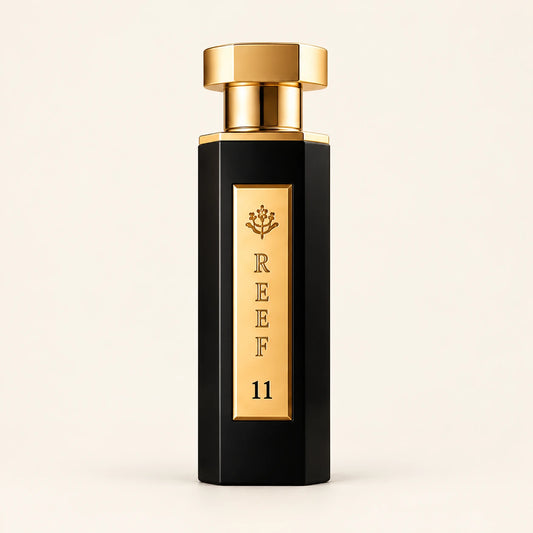 REEF 11 Eau de Parfum 100ml on a plain ivory studio background