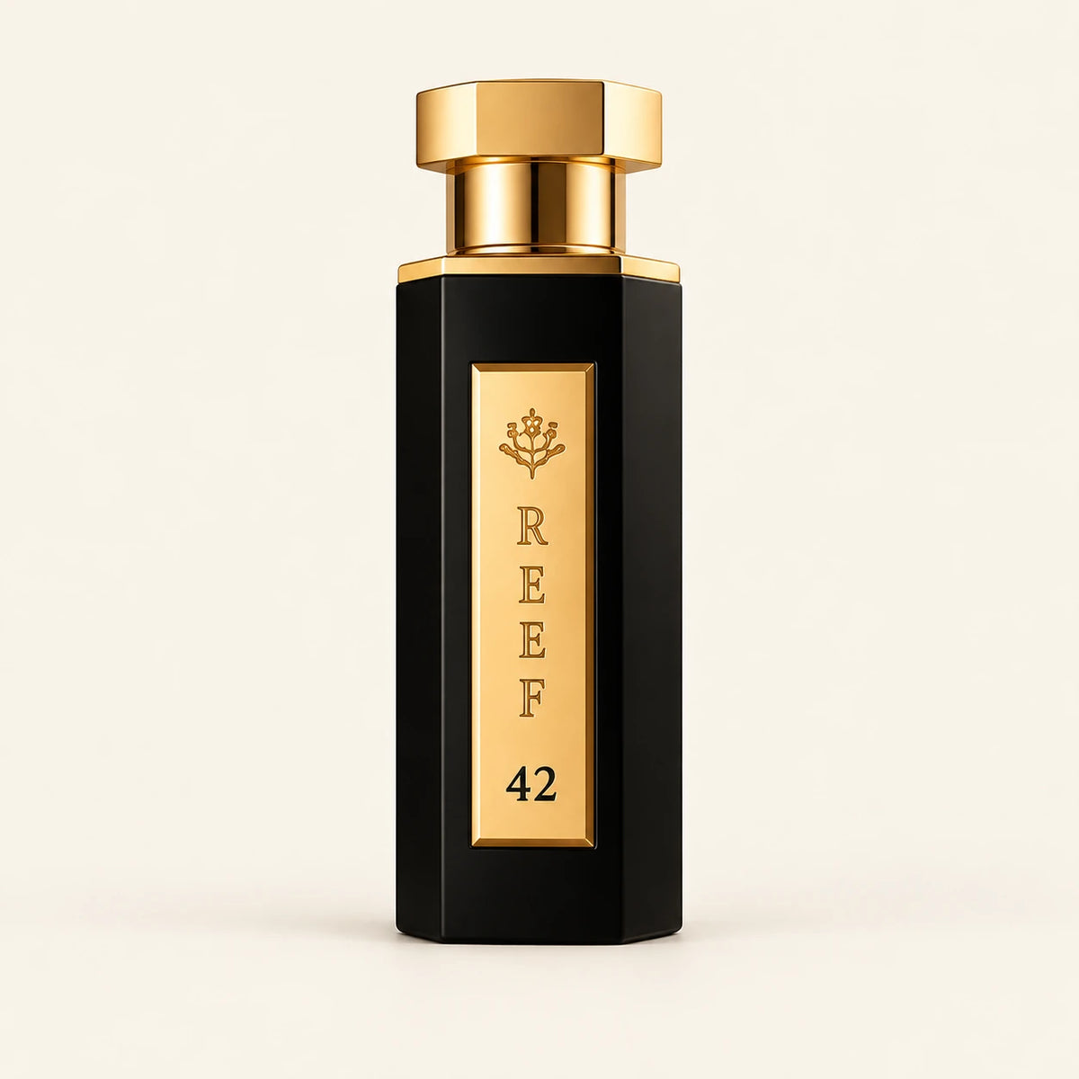 REEF 42 Eau de Parfum 100ml on a plain ivory studio background