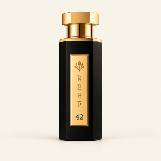 REEF 42 Eau de Parfum 100ml on a plain ivory studio background